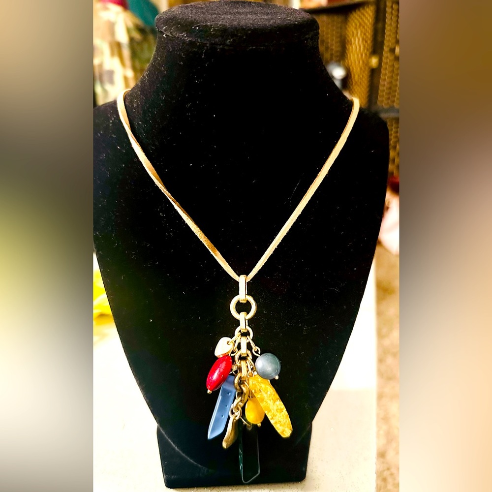 New-Chicos long stone pendant necklace with suede chain featuring gold tones.